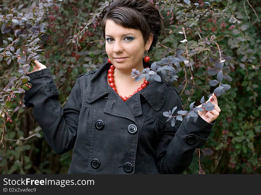 Pretty girl walking in autumn park