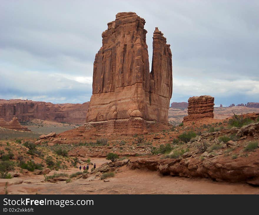 Park Avenue Trail, a 1-mile trail that follows the bottom of a canyon at the feet of the gigantic monoliths of Arches National Park. Park Avenue Trail, a 1-mile trail that follows the bottom of a canyon at the feet of the gigantic monoliths of Arches National Park.