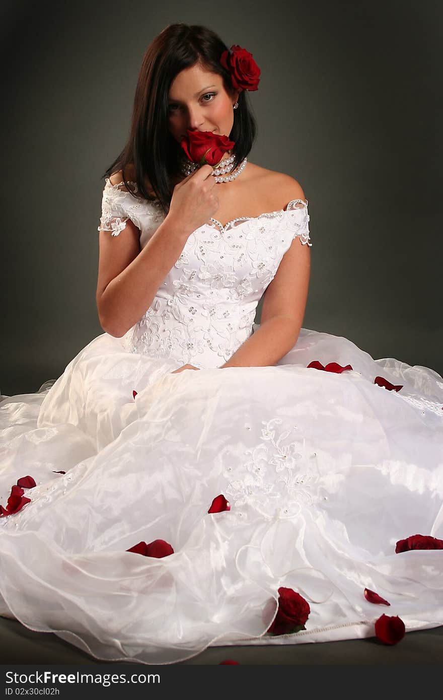 young bride with red roses. young bride with red roses