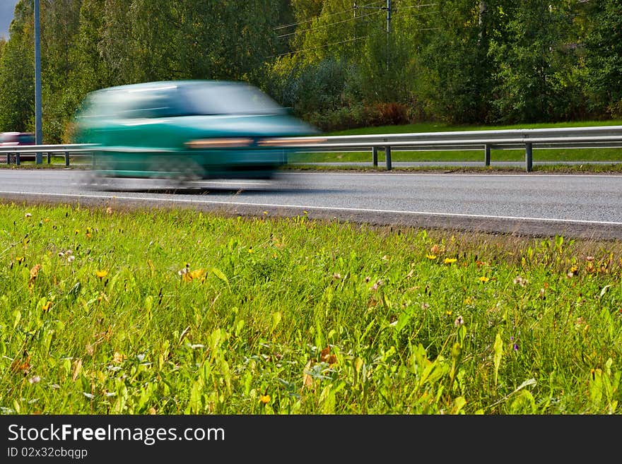 Fast Car On Highway