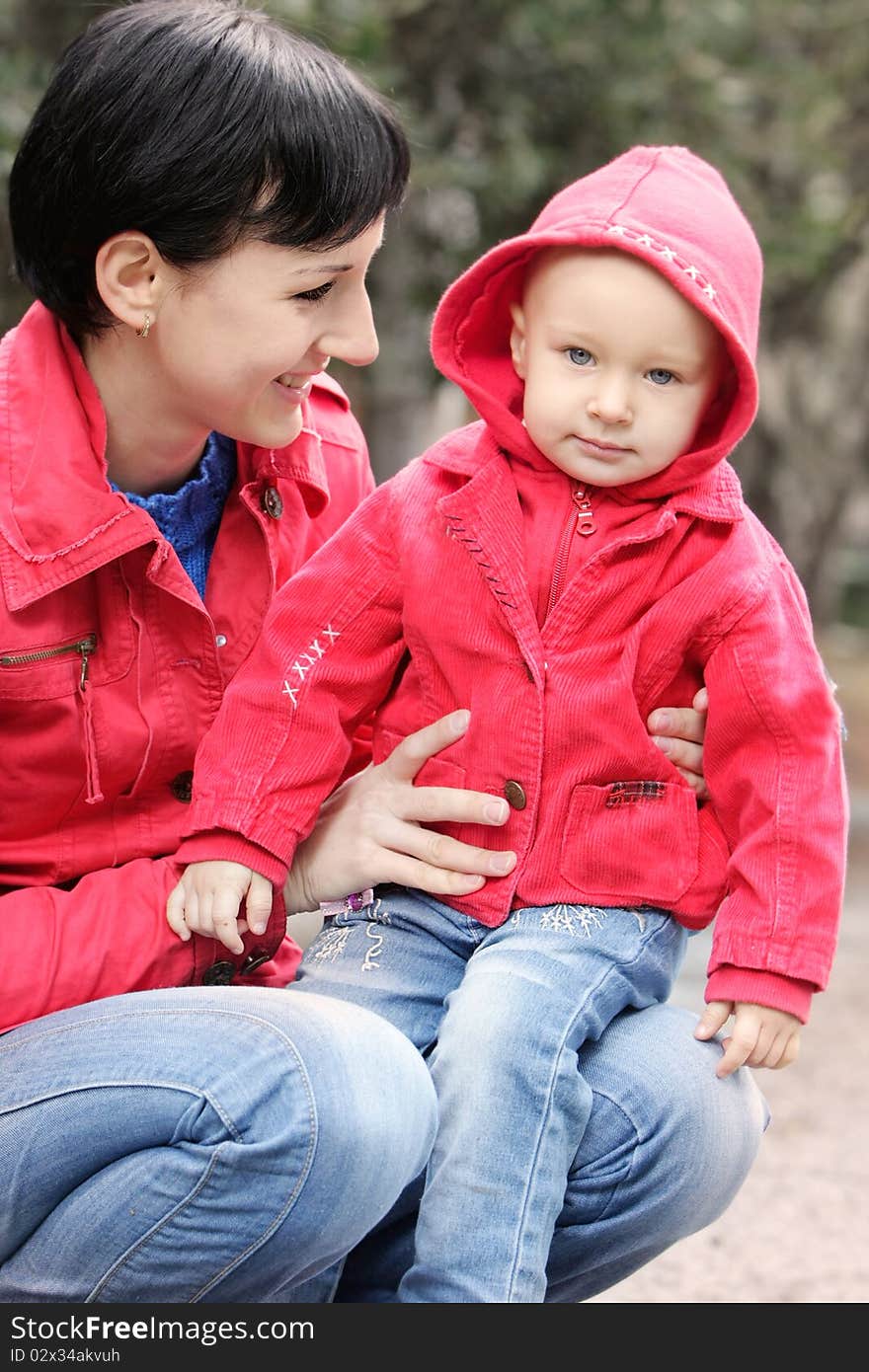 Outdoor portrait of mother and child