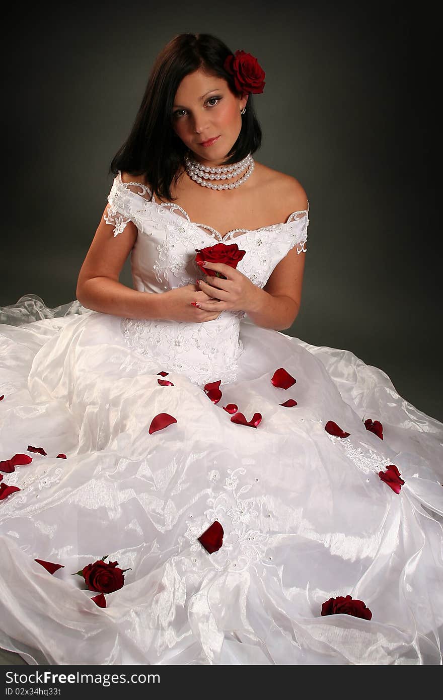 young bride with red roses. young bride with red roses