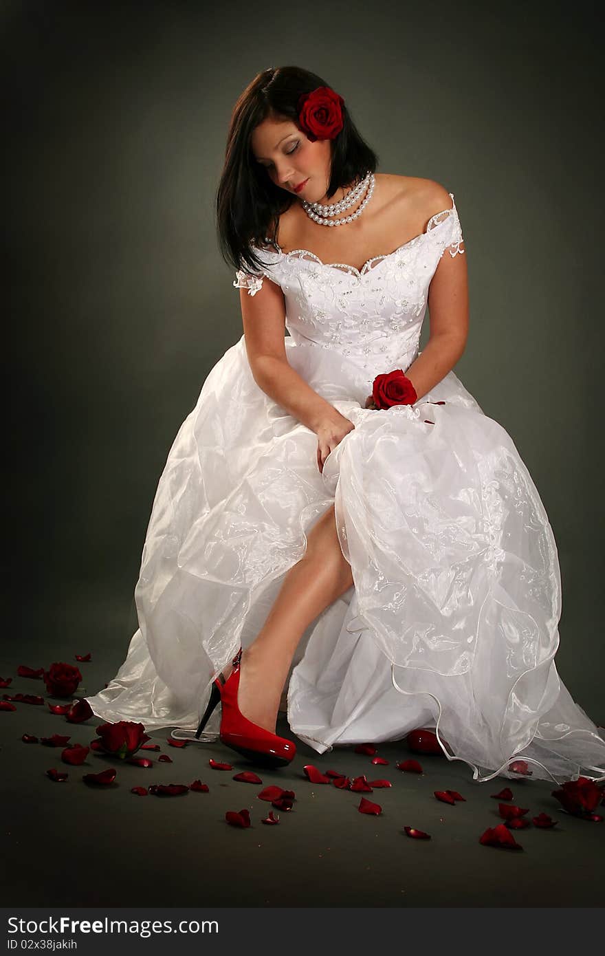 young bride with red roses. young bride with red roses