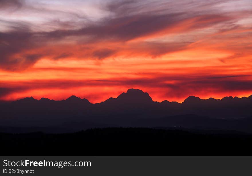 Grand Tetons mountain range in sun set