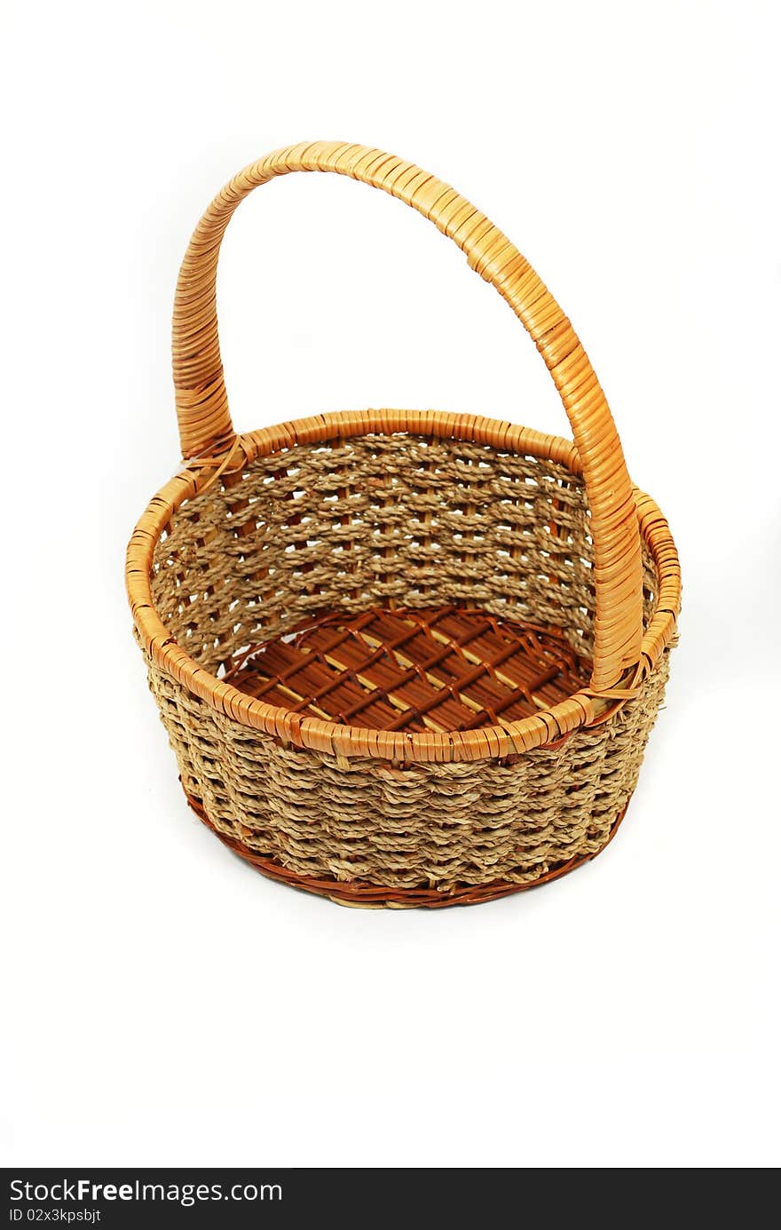 A polished basket made out of twigs. A polished basket made out of twigs