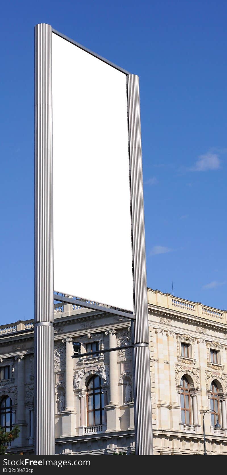 Modern billboard against the backdrop of the palace