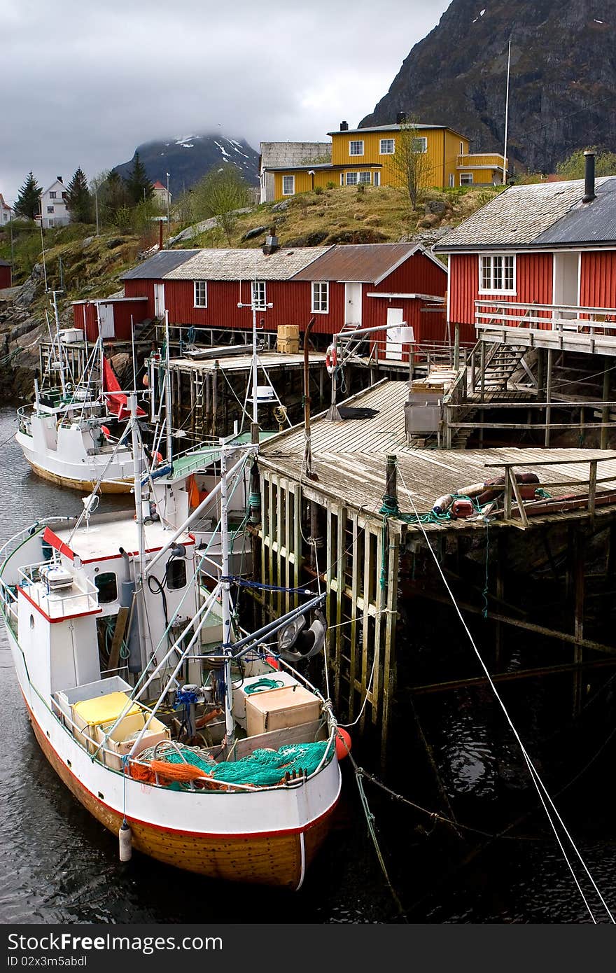 Boat at the pier in fisherman's village, Norway