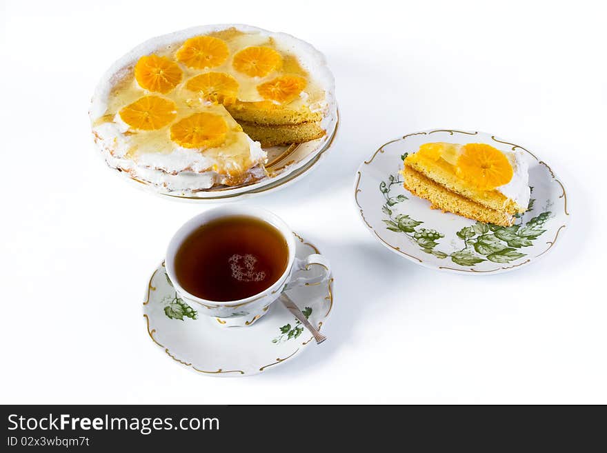 Still Life with a cup of tea and orange cake