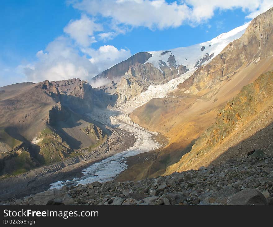 Glacier flowing down from the mountain. Glacier flowing down from the mountain.