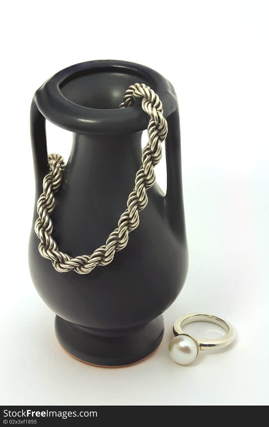 Vase, Chain And Ring