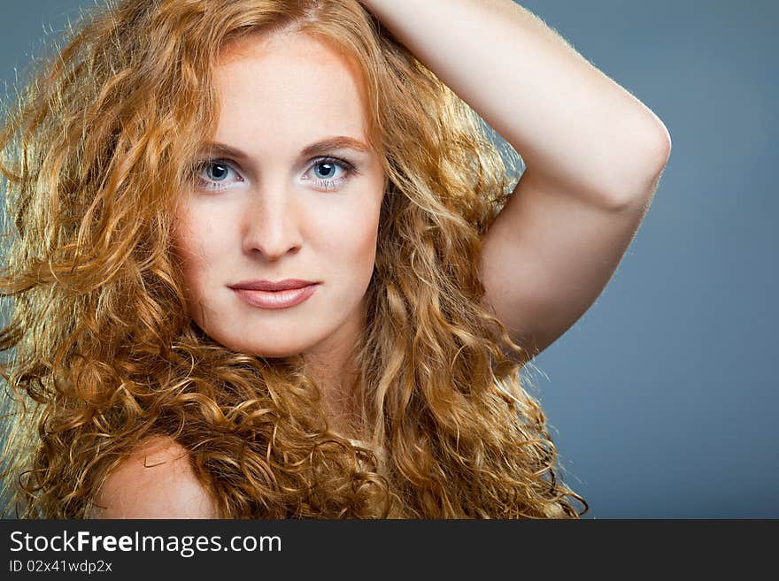 Portrait of beautiful lady on blue