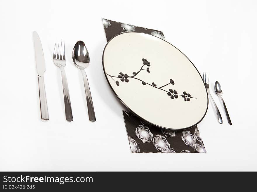 Restaurant serving with plate isolated on white