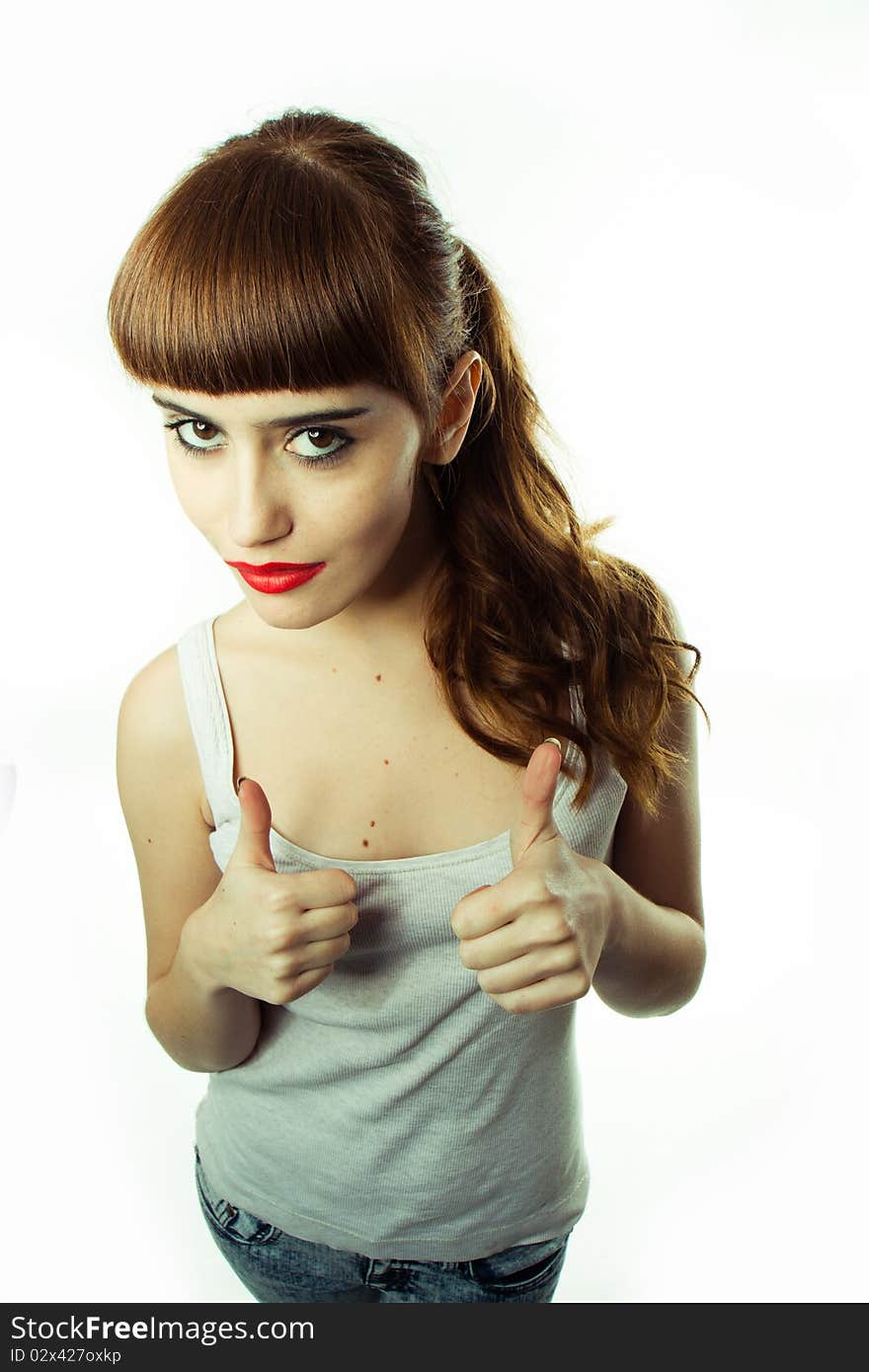 Young woman with thumbs up