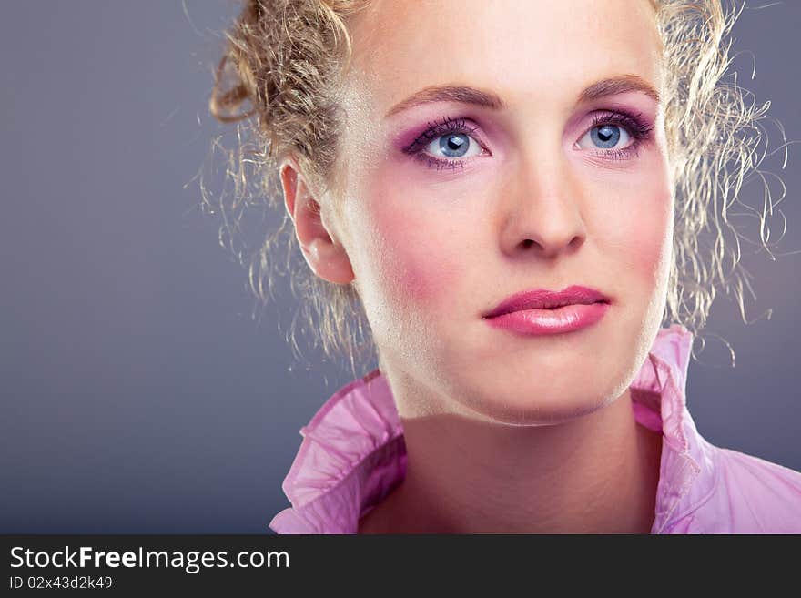 Portrait of beautiful lady on blue