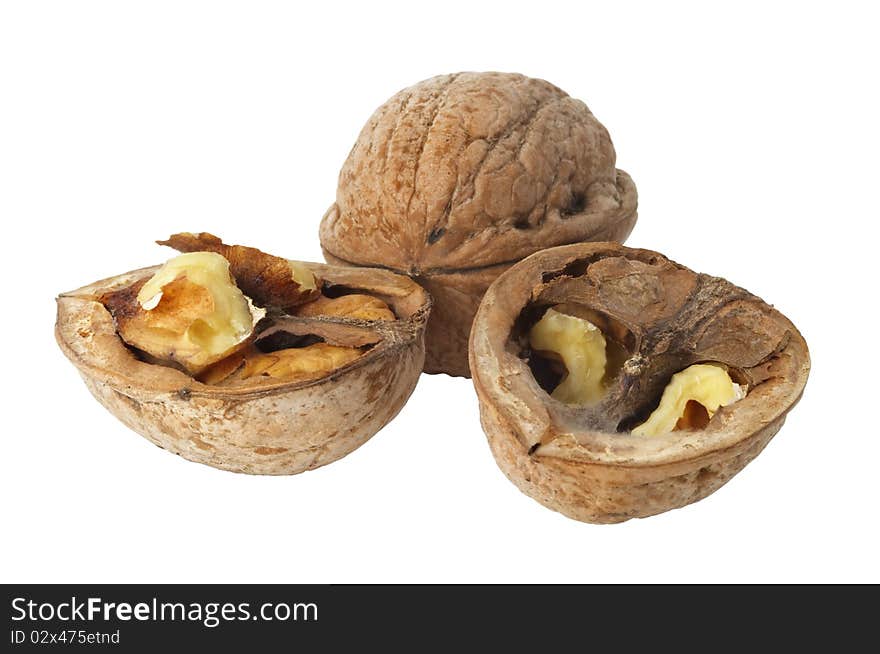 Two walnuts (whole and a cracked one) isolated over white background