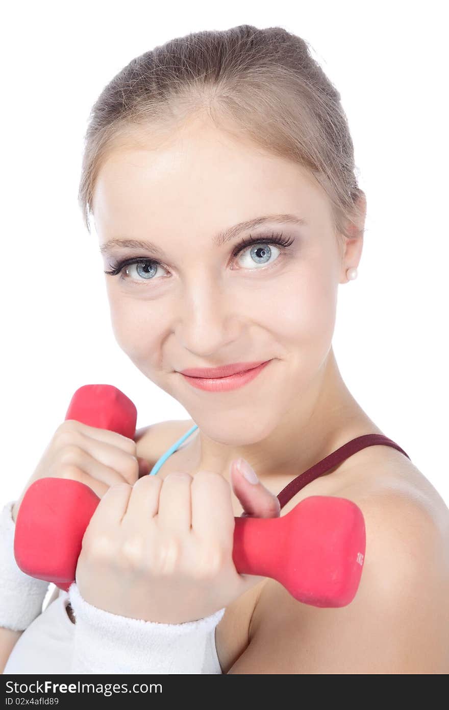 Beautiful woman in fitness over white background. Beautiful woman in fitness over white background