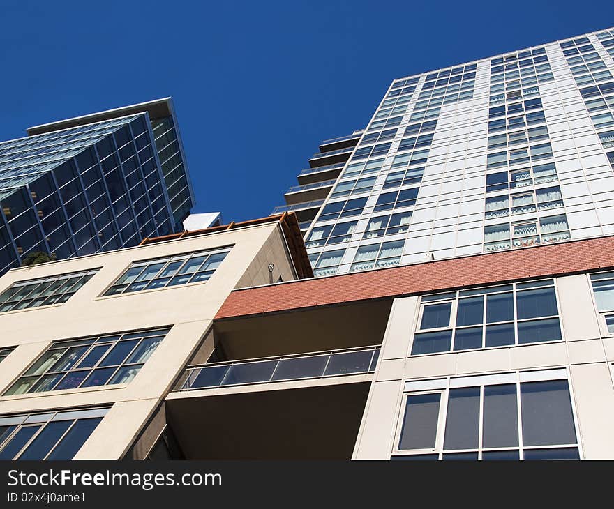 Grouping of office towers against a blue sky