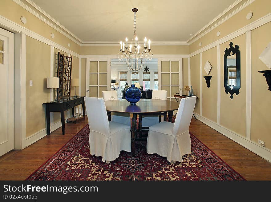 Dining room in luxury home with tan walls. Dining room in luxury home with tan walls