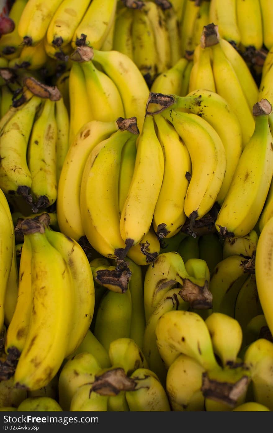 Fresh natural bananas background .