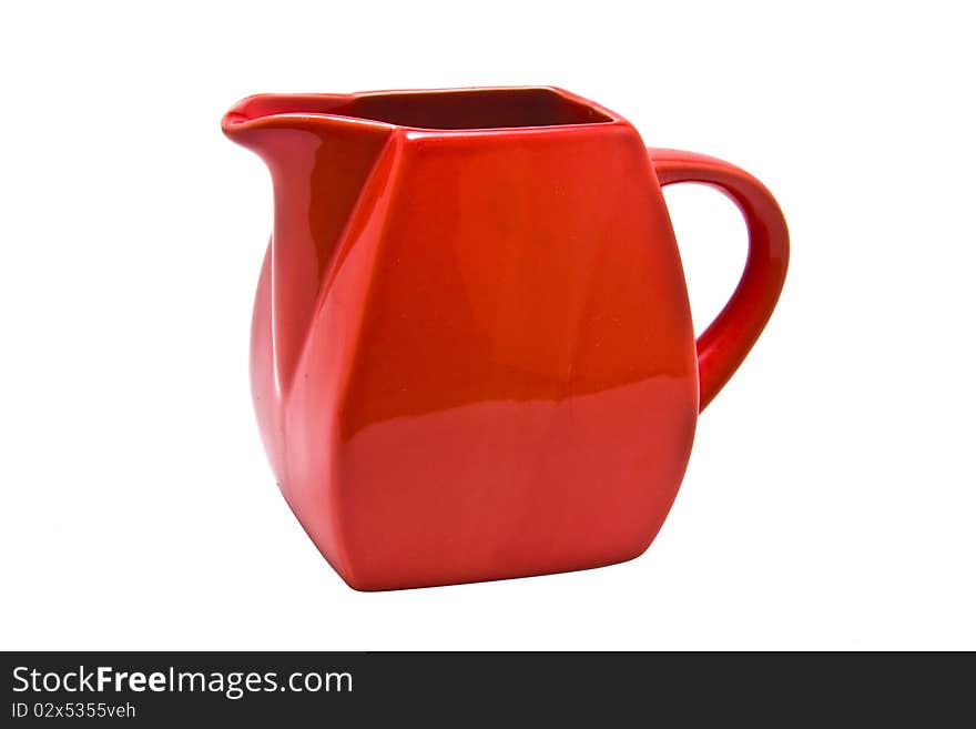 Small red olive oil jug isolated on a white background. Small red olive oil jug isolated on a white background