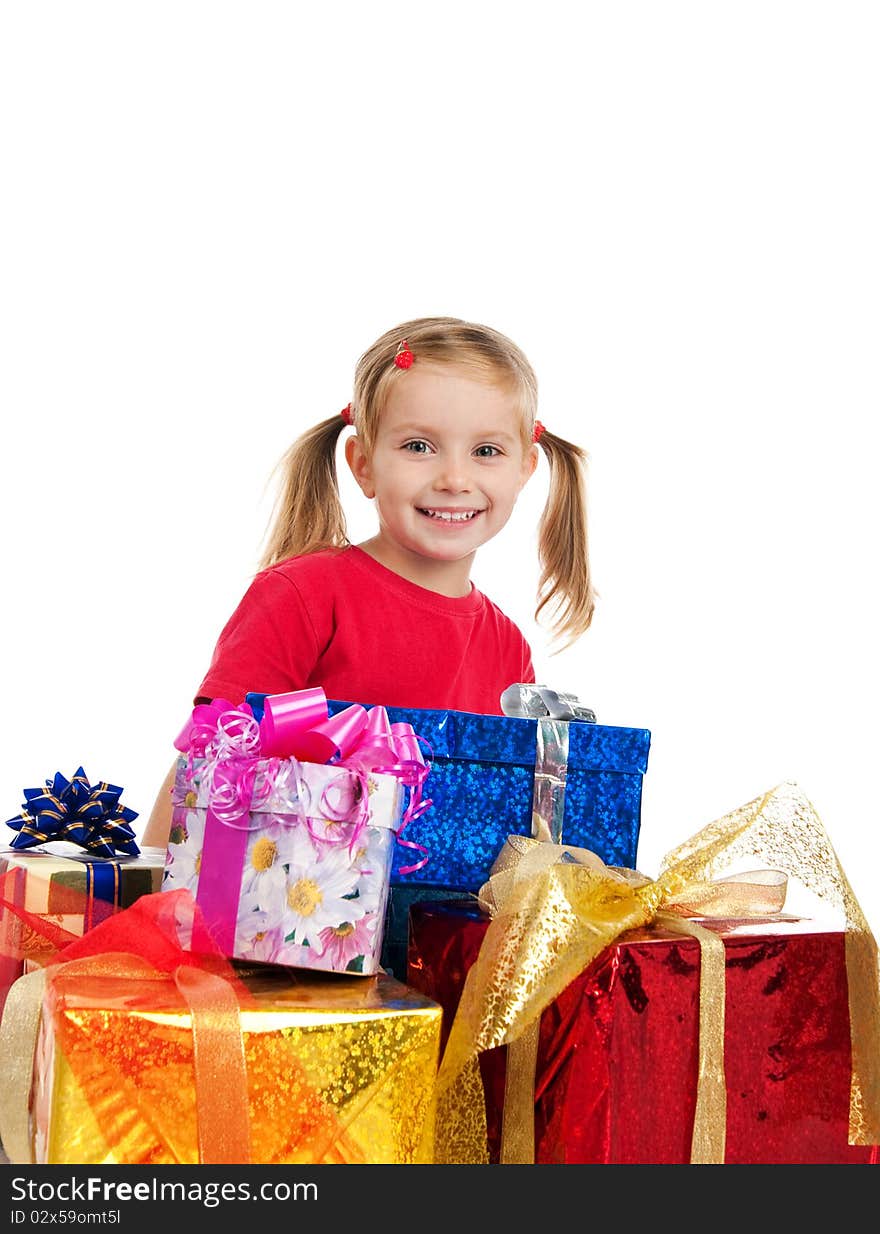 Four years old girl wih the presents. Four years old girl wih the presents