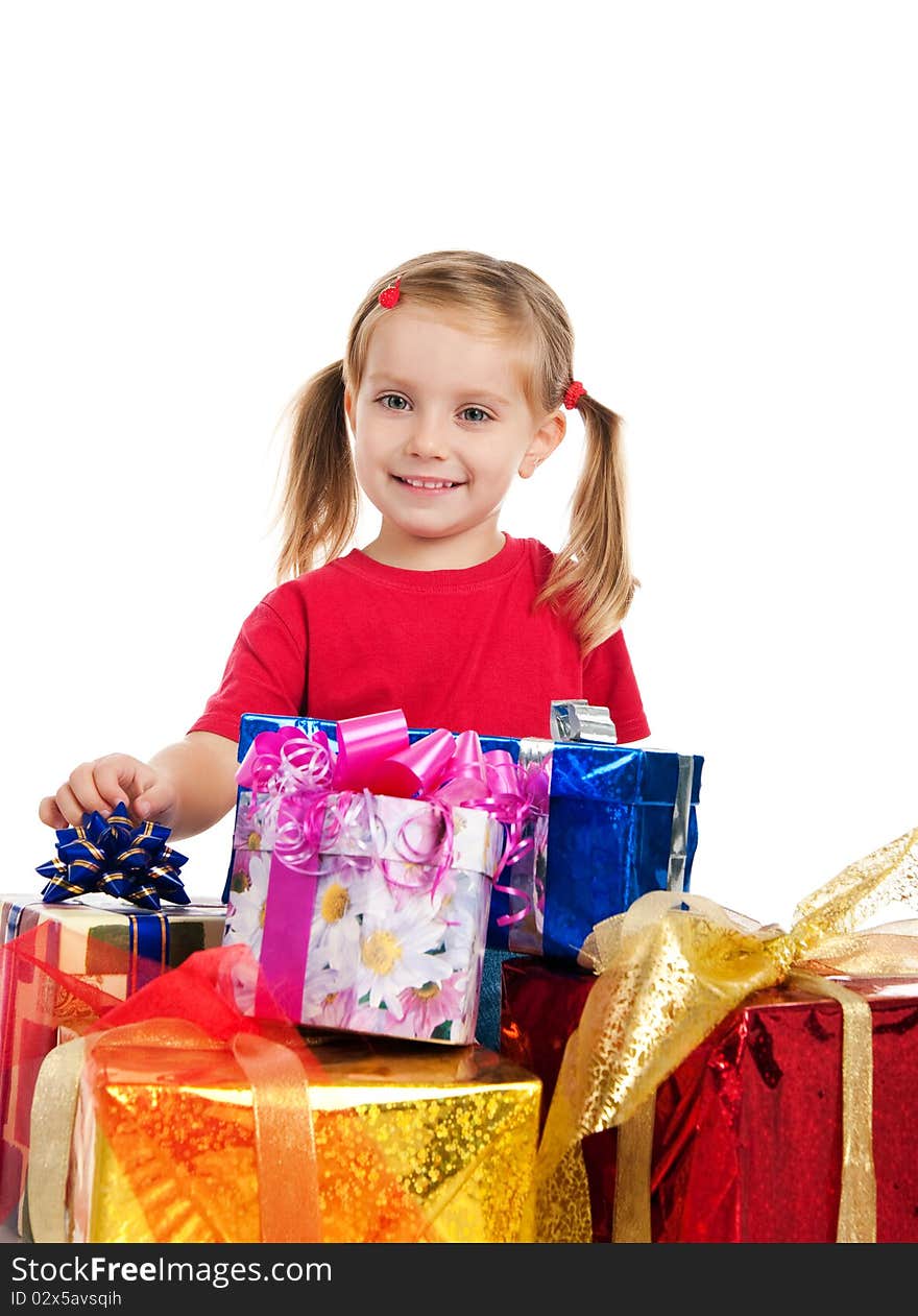 Four years old girl wih the presents. Four years old girl wih the presents