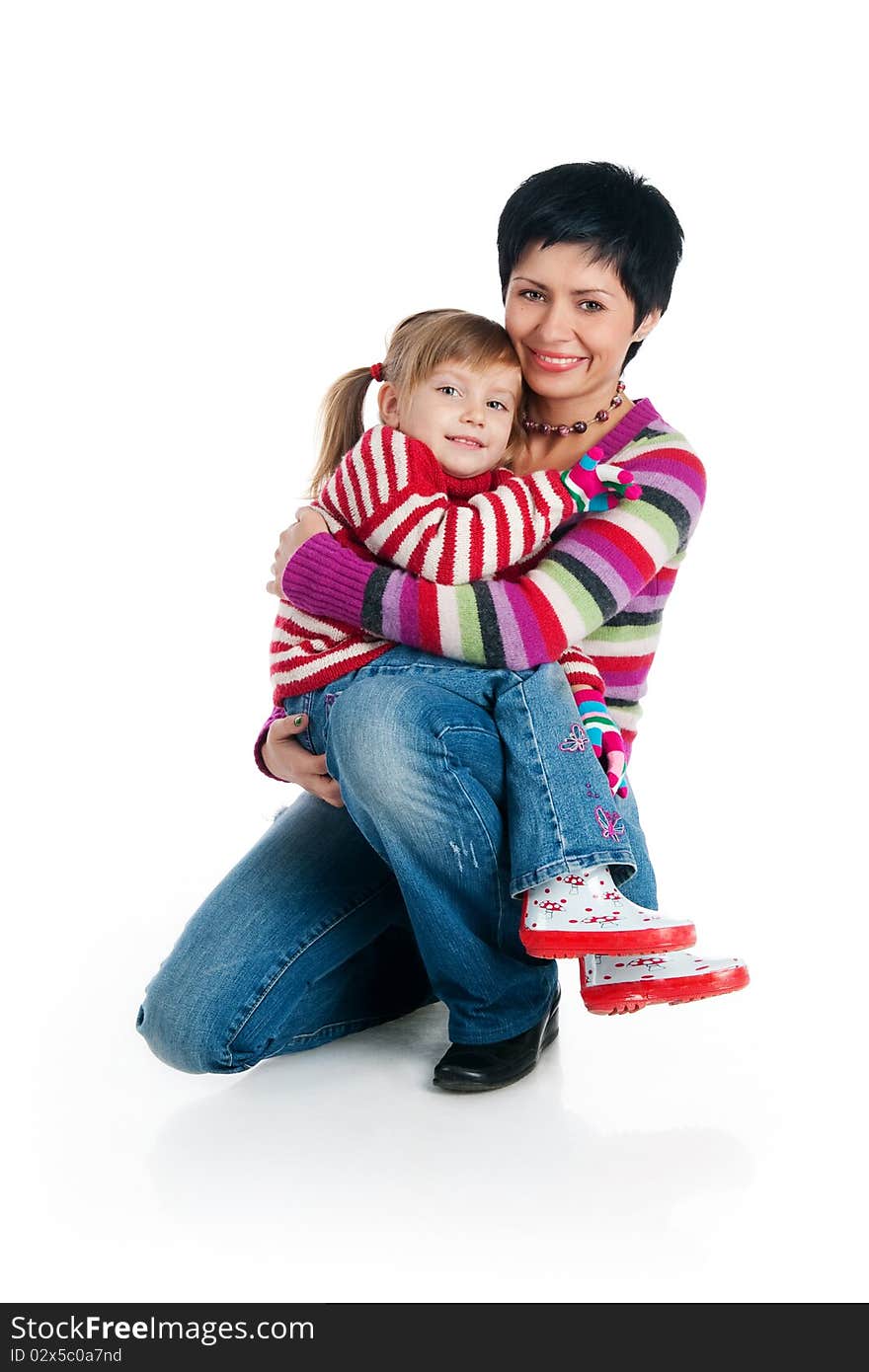 Mother and her daughter on white