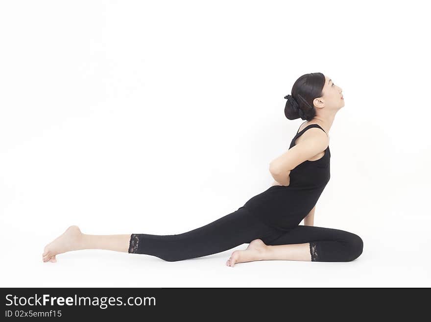 Asian model doing yoga on white background