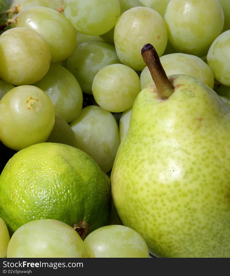 A set of different healthy and tasty green fruits