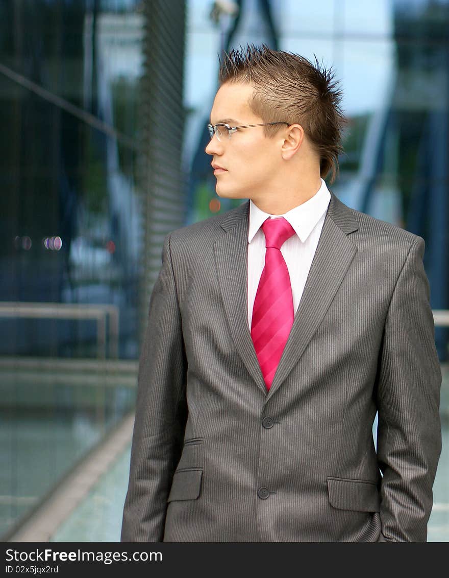 A young businessman in formal clothes