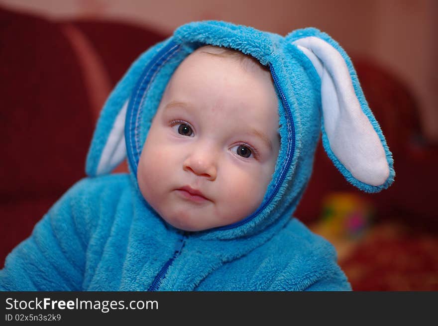 Photo of baby boy in suit of the rabbit