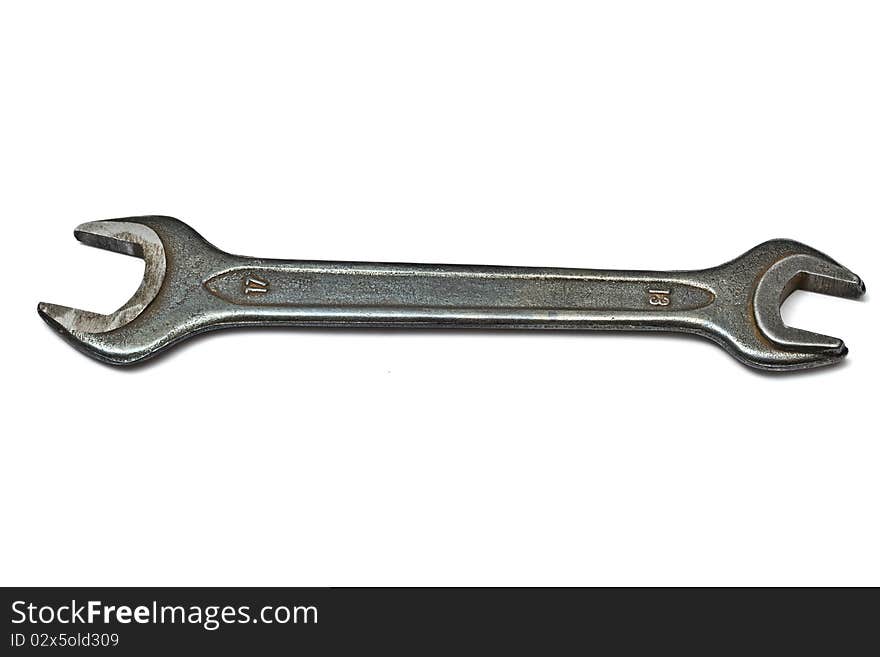 An old wrench isolated on white