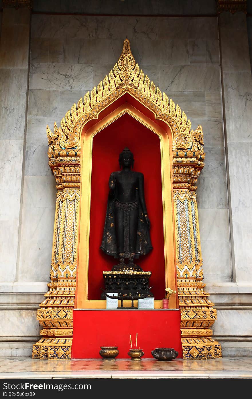 Statue of Buddha in temple of Bangkok Thailand.