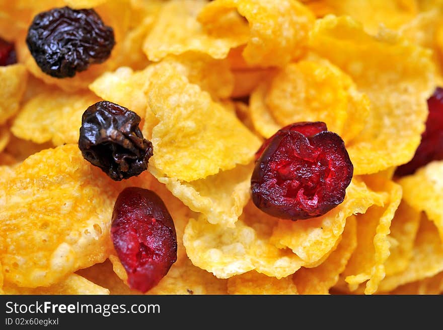 Cereal with raisins and cranberries for a nutritious and healthy breakfast. For healthy lifestyle, diet and nutrition, and food and beverage concepts. Cereal with raisins and cranberries for a nutritious and healthy breakfast. For healthy lifestyle, diet and nutrition, and food and beverage concepts.