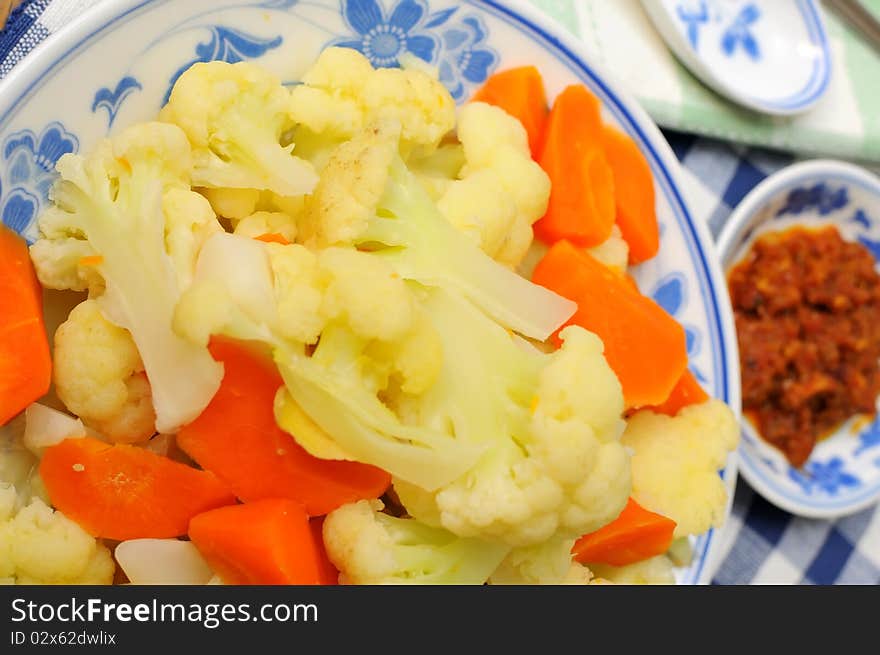 Traditional Oriental delicacy served on China kitchenware.