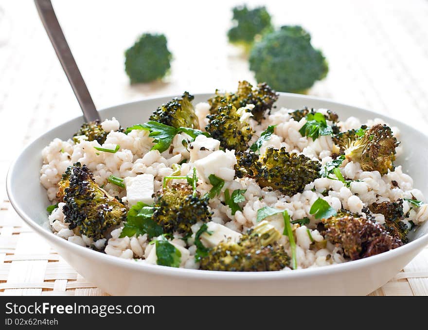 Broccoli salad with parsley, farro and cheese. Broccoli salad with parsley, farro and cheese