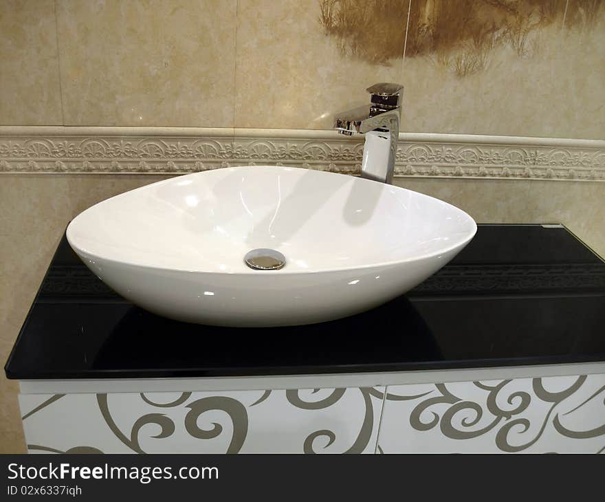 White porcelain washstand in beige bathroom