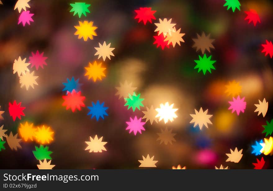 Colorful defocused star lights background. Colorful defocused star lights background