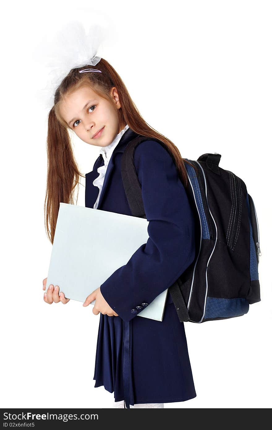 Little Girl With Backpack And Book