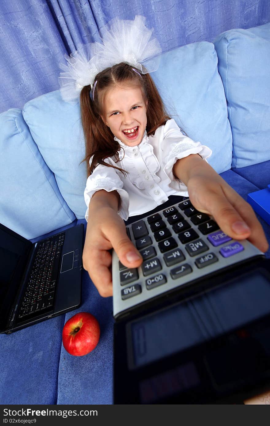 Girl with calculator, laptop