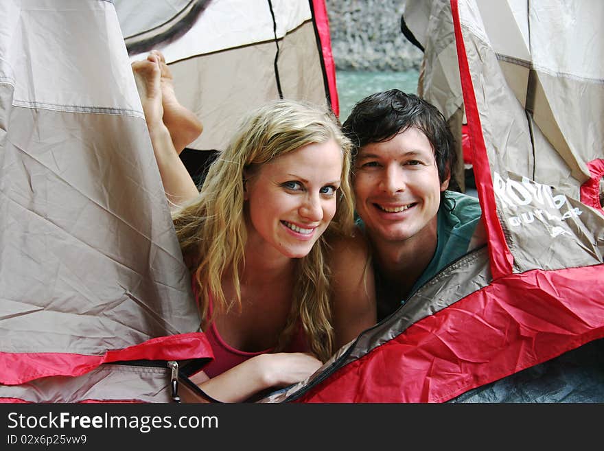 Couple laying in tent