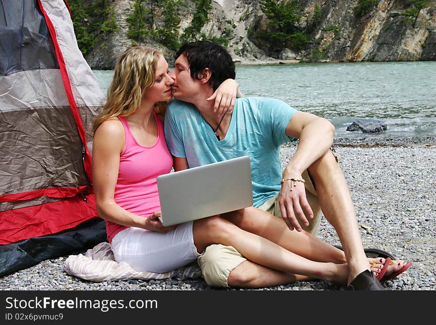 Couple ready for kiss while camping. Couple ready for kiss while camping