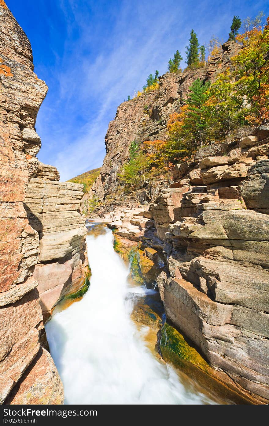 Autumn landscape, stormy mountain river. Autumn landscape, stormy mountain river