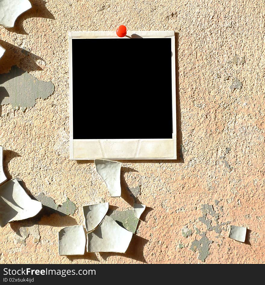 Old blank photo frame over old wall. Old blank photo frame over old wall