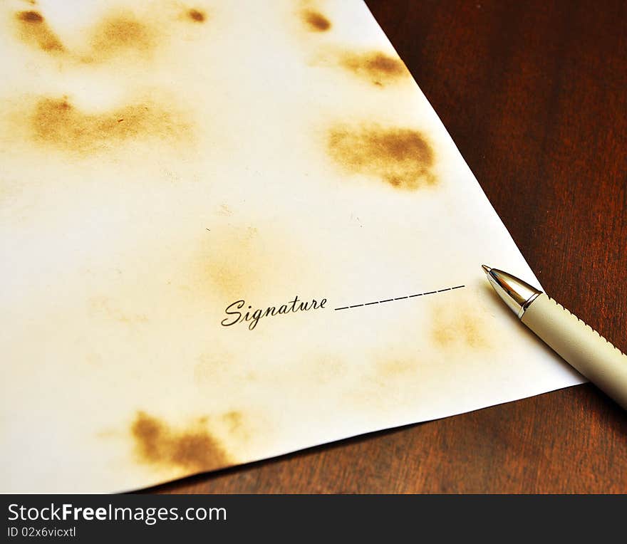 Pen with a sheet of paper for signature. Pen with a sheet of paper for signature