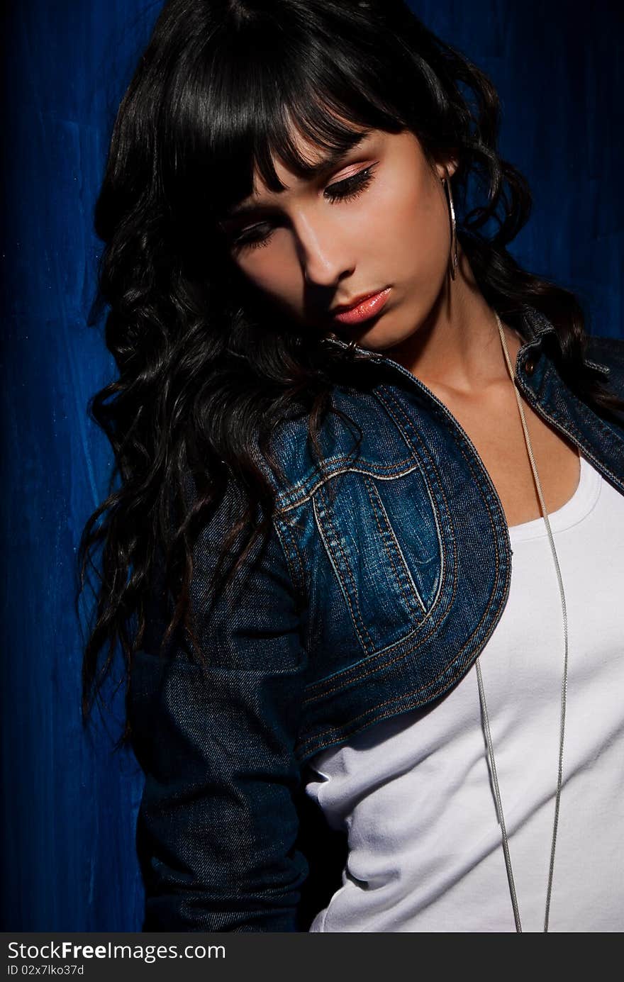 Beautiful young woman portrait in studio