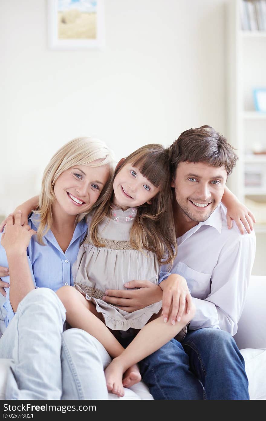 A happy family with a child at home. A happy family with a child at home