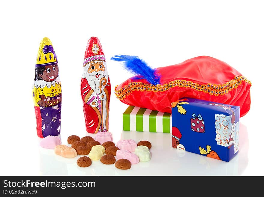 Dutch Sinterklaas celebration with gifts and candy gingernuts isolated on white background