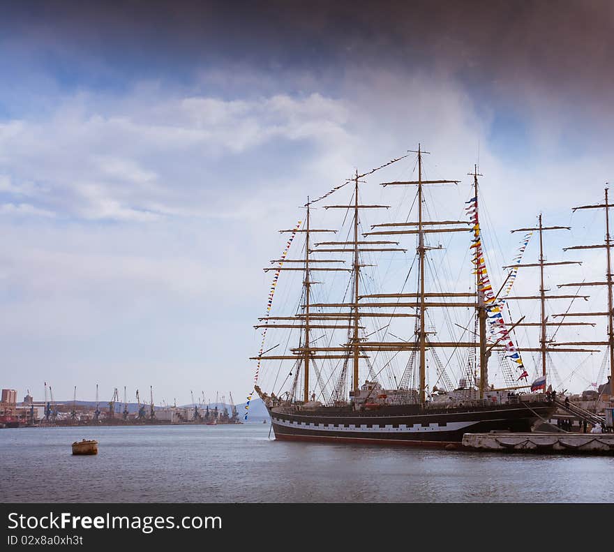 Masts of sailing ships lying at the wharf skyline. Masts of sailing ships lying at the wharf skyline