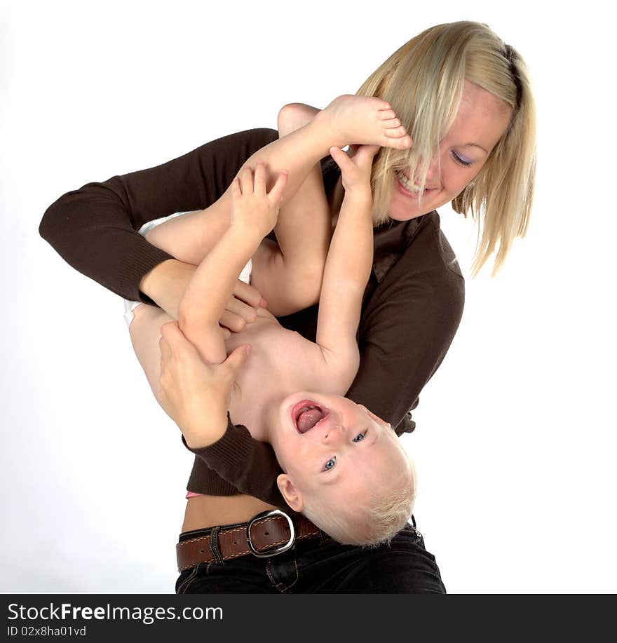 Happy mother with baby, isolated on white background